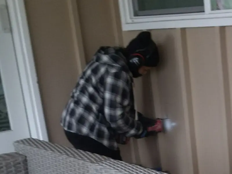 Professional electrician installing an exterior outlet in Lower Nazareth